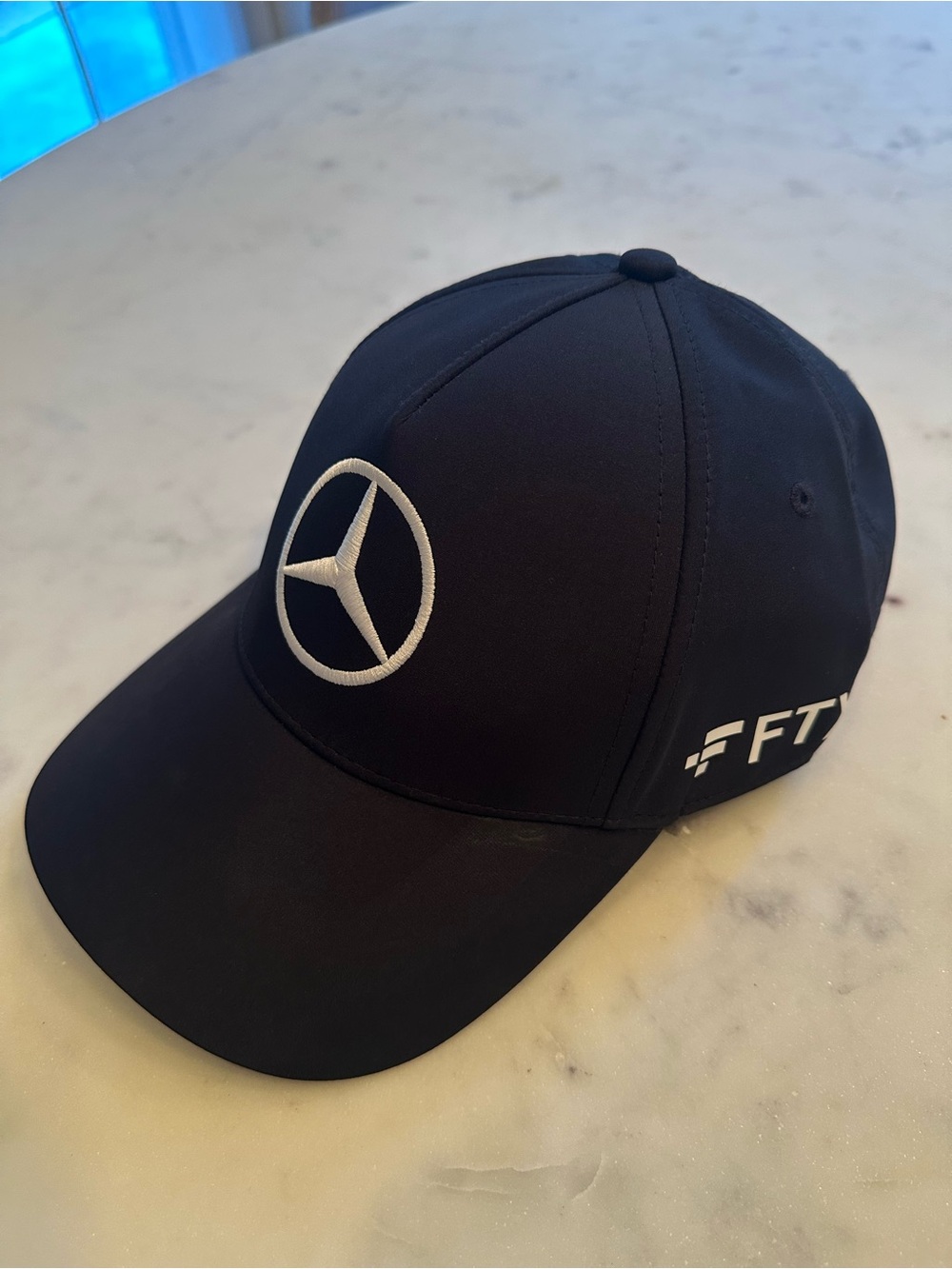 Mercedes AMG Petronas Black Baseball Cap with White Star Emblem